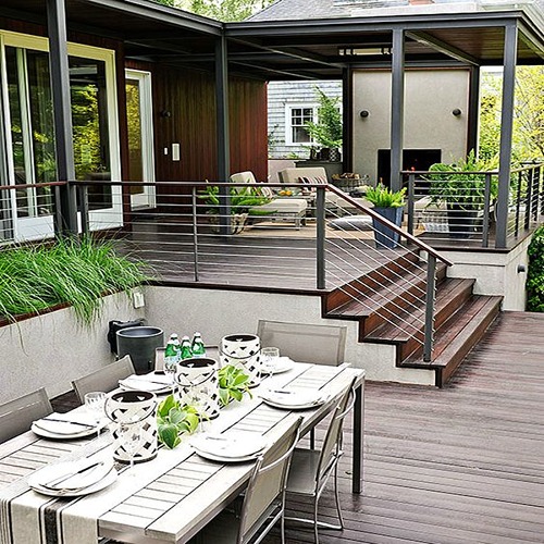 Modern outdoor dining area with plants