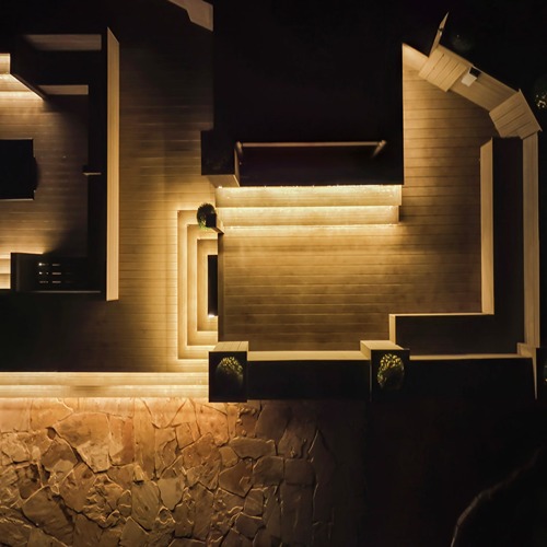 Illuminated modern architectural design at night