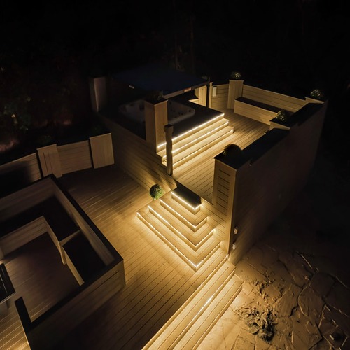 Illuminated outdoor deck at night
